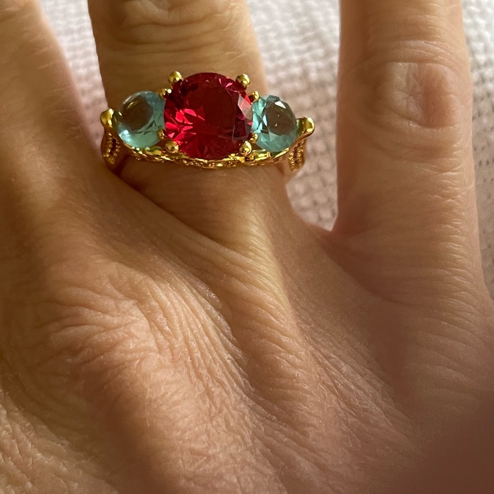 Elegant Gold Ring with Red and Blue Stones